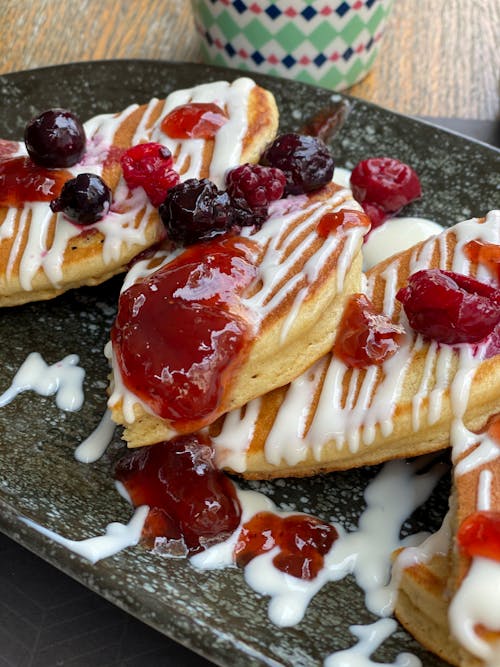 Free Pancakes with Cream and Berries on Top Stock Photo