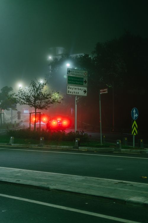Free Foggy night scene of illuminated traffic on a highway in İstanbul, Turkey. Stock Photo