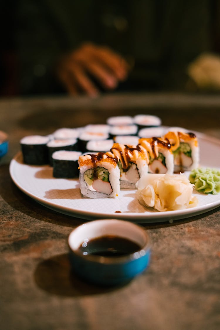 An Assorted Sushi On A White Plate