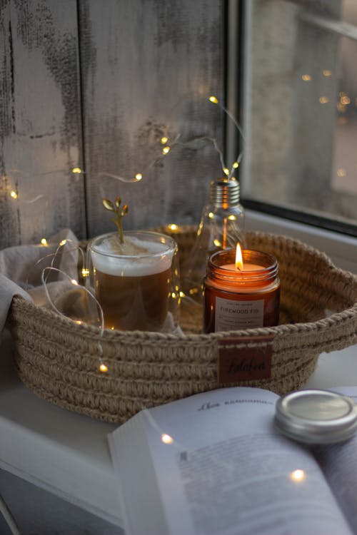 Clear Glass Candle Holder on Brown Woven Basket