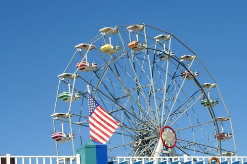 Free stock photo of american flag, ferris wheel