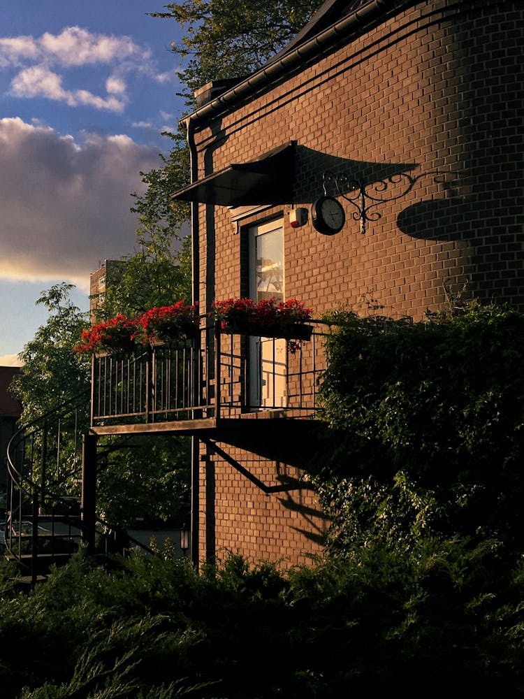 Balcony Of House Decorated With Flowers