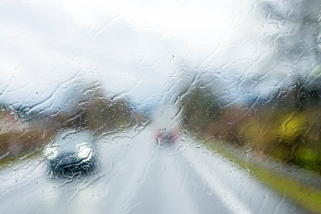 Car behind Window in Rain