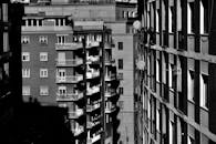 Grayscale Photo of Apartment Buildings