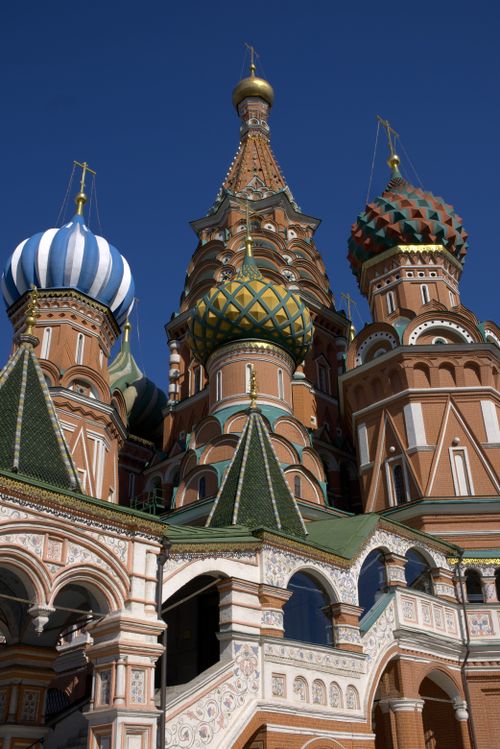Free Explore the iconic domes of St. Basil's Cathedral with intricate designs against a blue sky in Moscow. Stock Photo