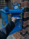 A Person Dropping Mails in the Mailbox