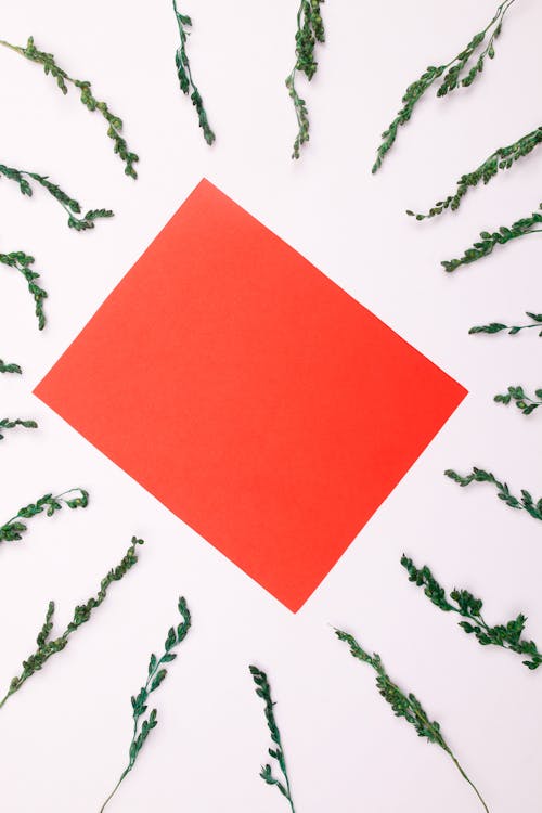 Free Red Paper on White Background Stock Photo