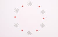 Paper Cutouts on White Surface