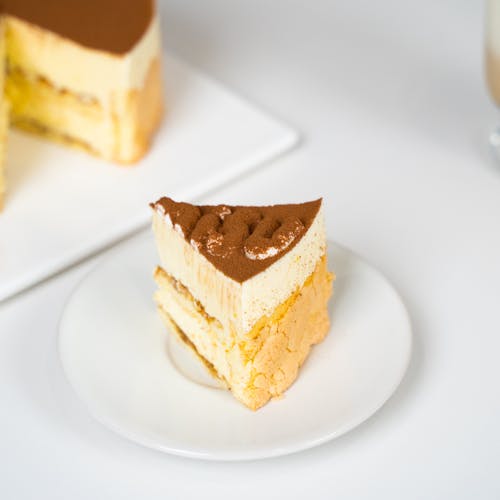 Free Sliced of Cake on White Ceramic Plate Stock Photo