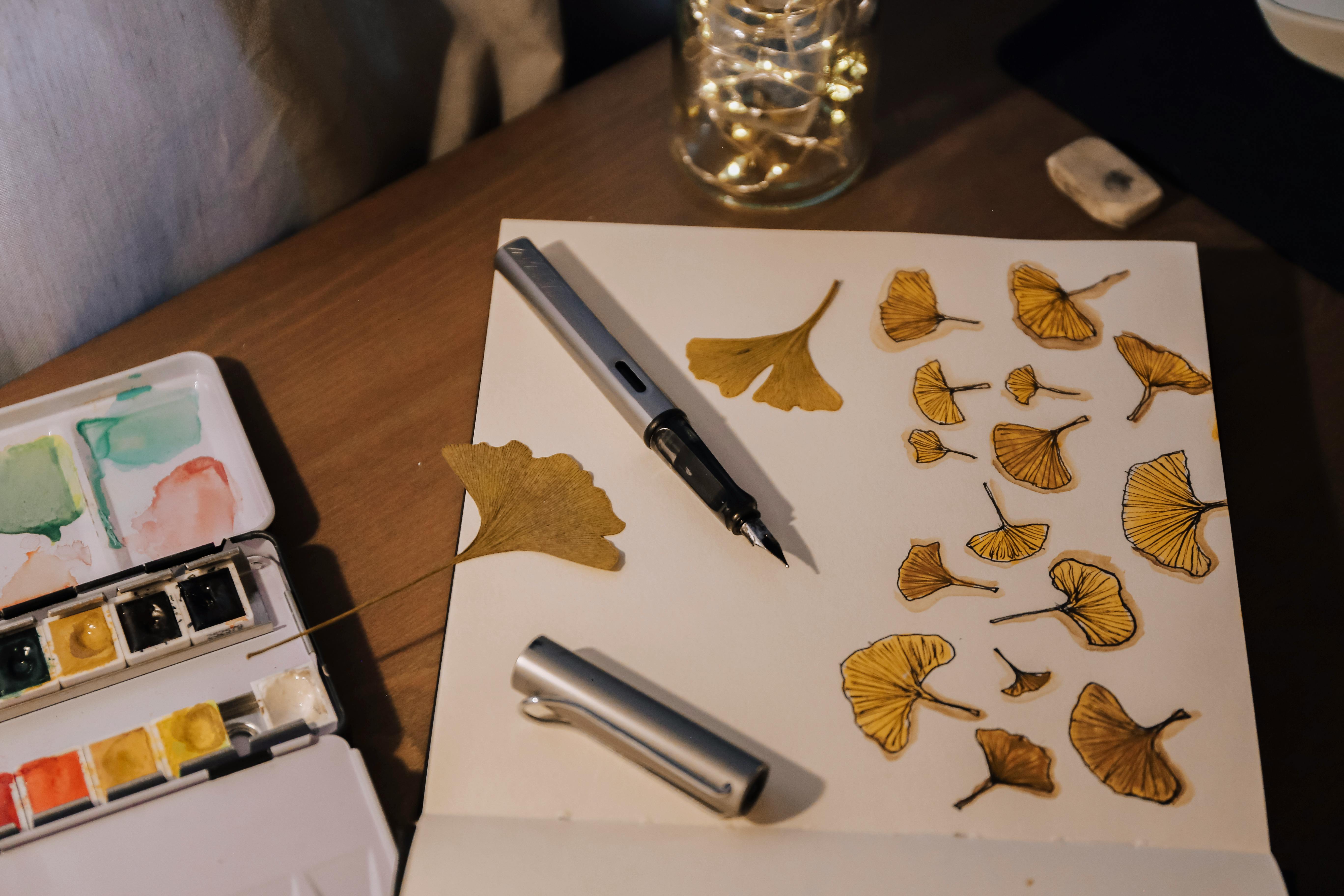 sketchbook on desk natural light lifestyle photo 2