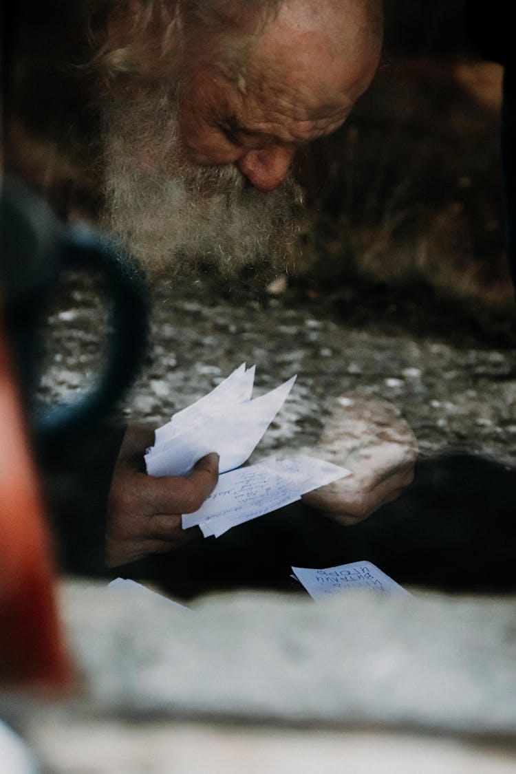 Person Holding Papers