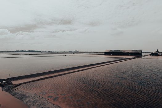 Body of Water Under Cloudy Sky