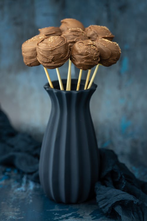 Chocolate Lollipops on Ceramic Vase