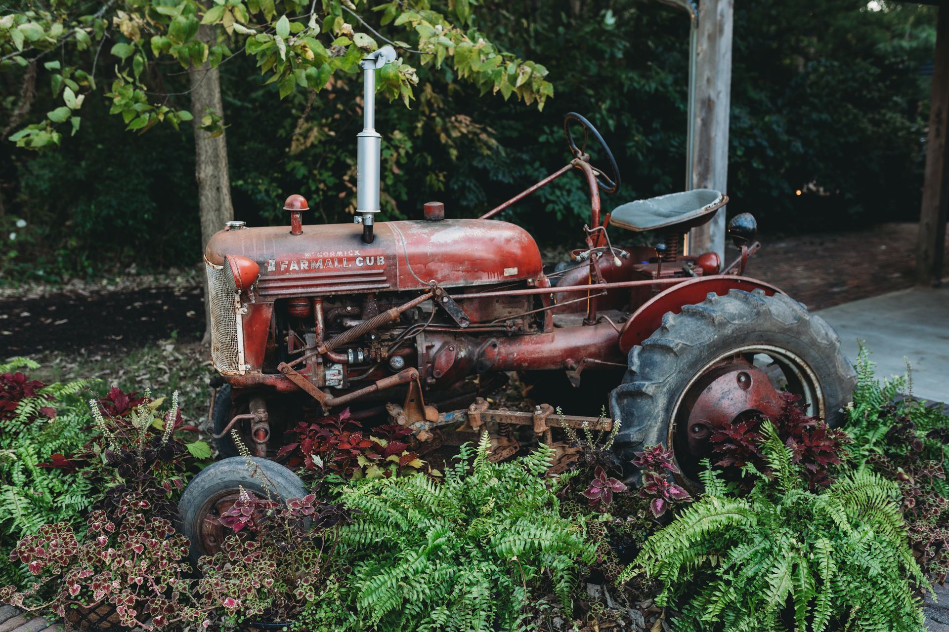 A Red Tractor in the Garden
