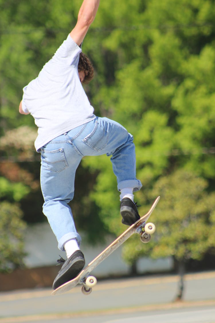 Man Jumping On A Skateboard