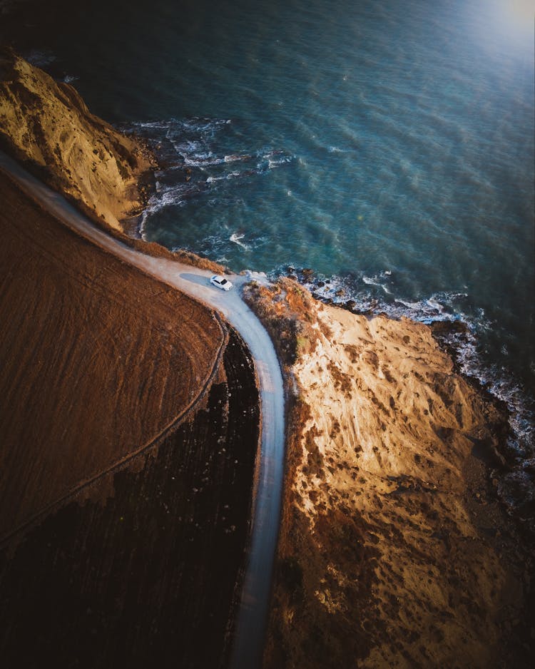 Aerial View Of Sea And Beach And A Street On The Seashore