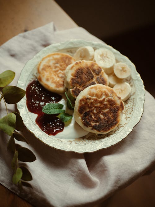 Free Pancakes with Banana and Jam Stock Photo