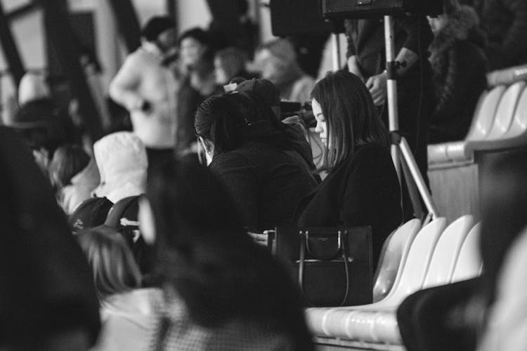 Group Of People Siting On Audience