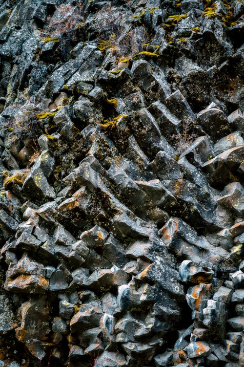Free Close-up of an eroded rock face showcasing natural textures and patterns, ideal for nature backgrounds. Stock Photo