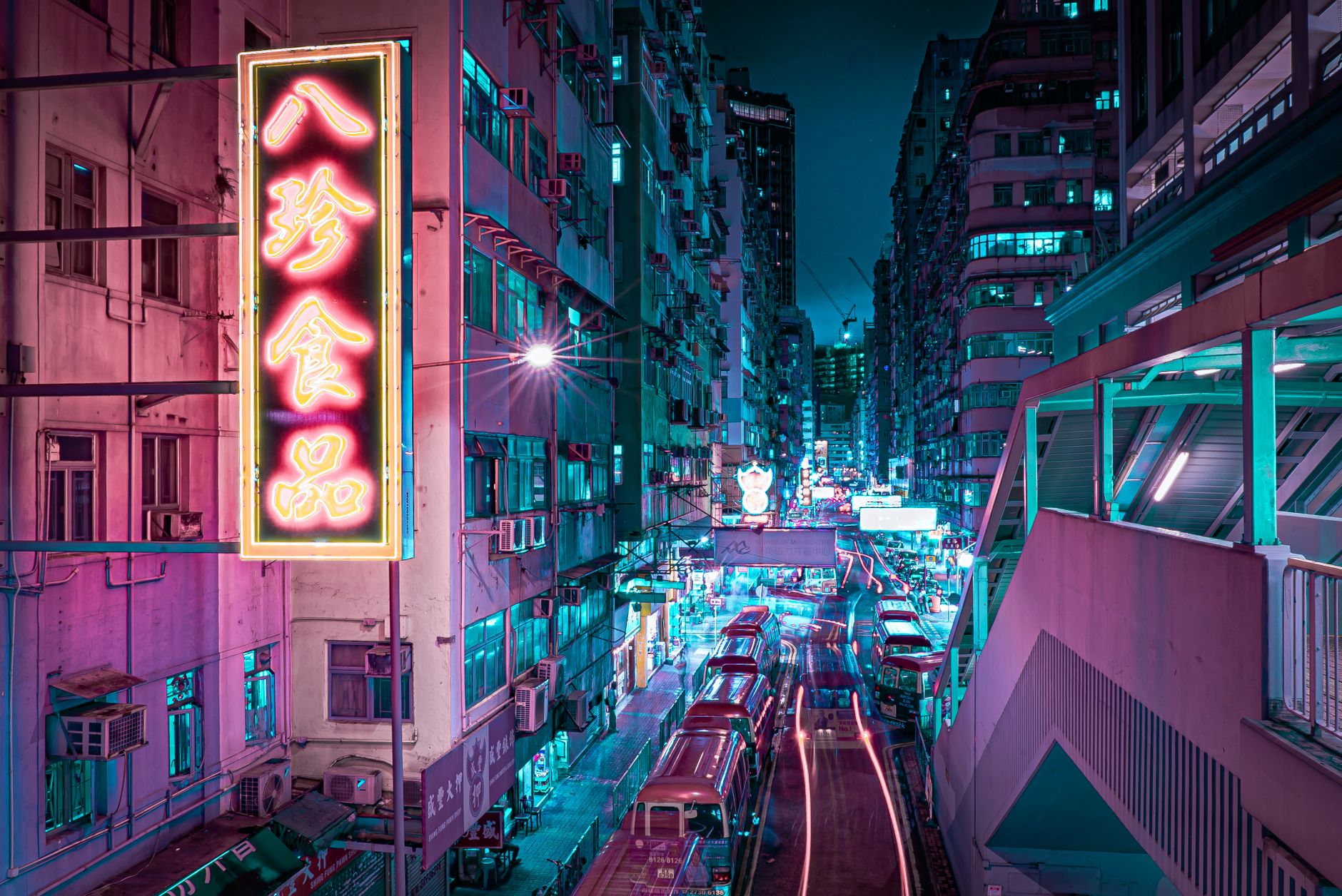 A captivating night view of a Hong Kong street illuminated by colorful neon lights, showcasing urban vibrancy.. pexels, capti
