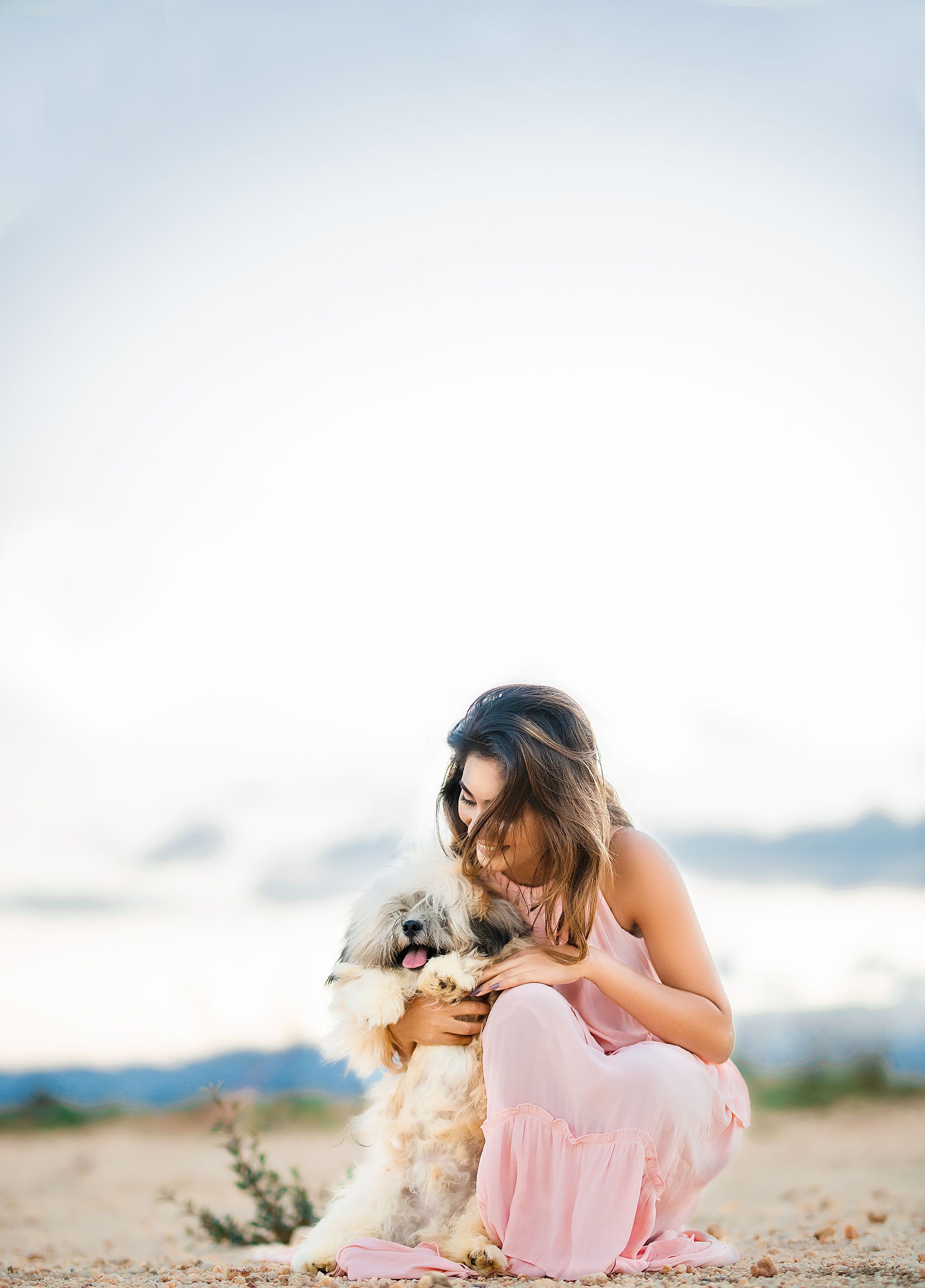 Woman Hugging Dog Free Stock Photo