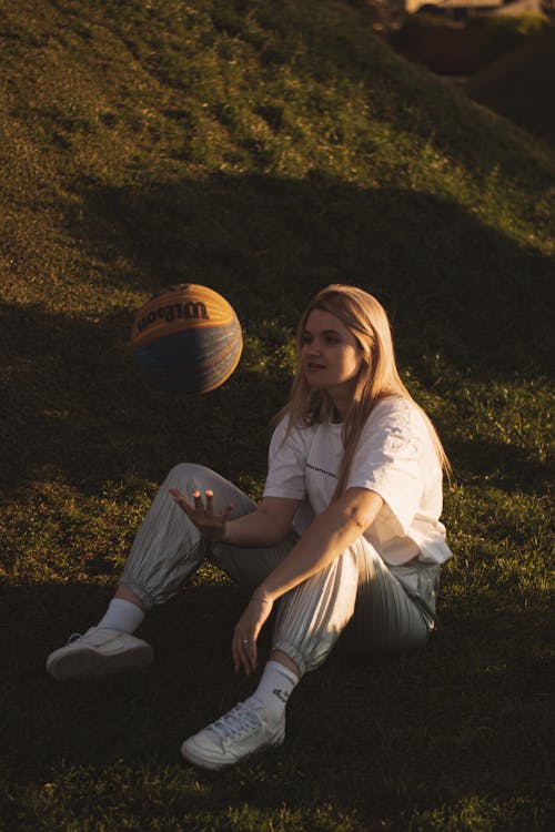 A Woman Sitting on the Grass