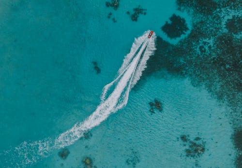 Aerial Photography of a Boat on Blue Ocean