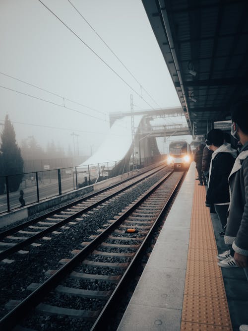 Free People in Train Station Stock Photo