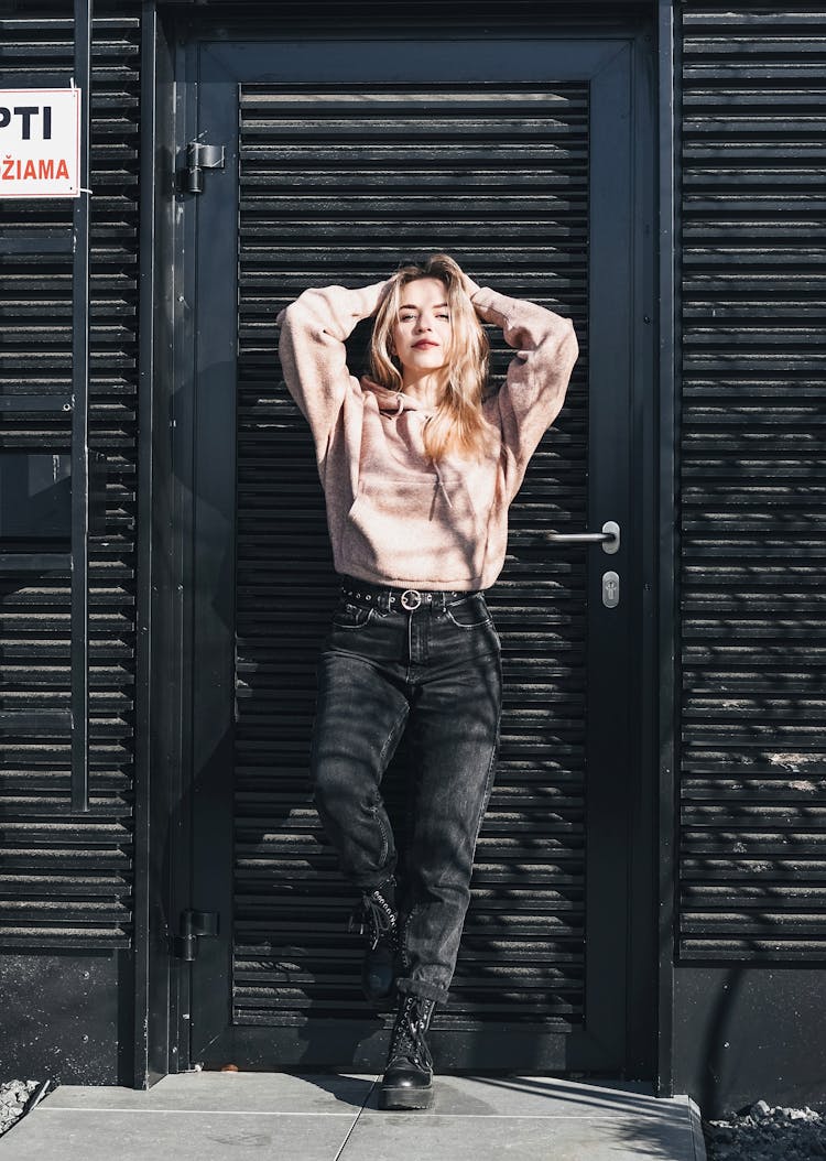 Woman Posing By Door