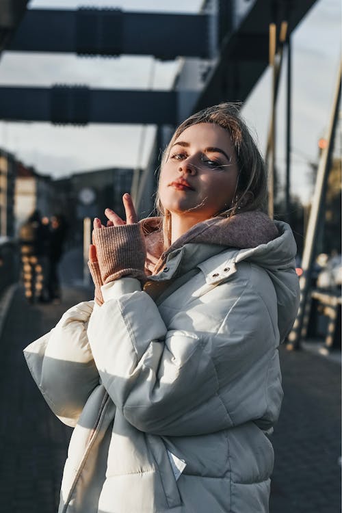 A Woman in Gray Puffer Jacket