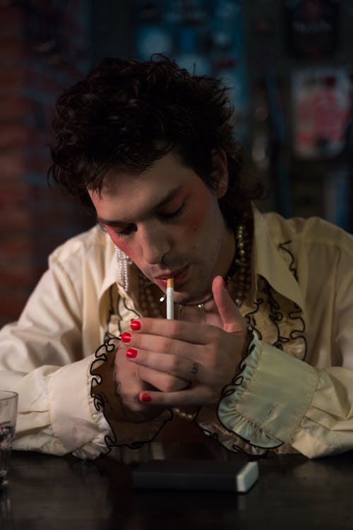 A Person Smoking Cigarette