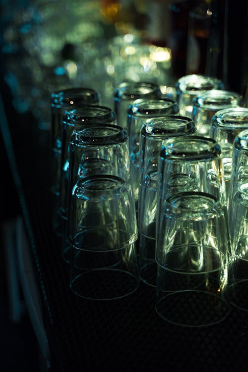 Clear Drinking Glasses on the Bar Counter