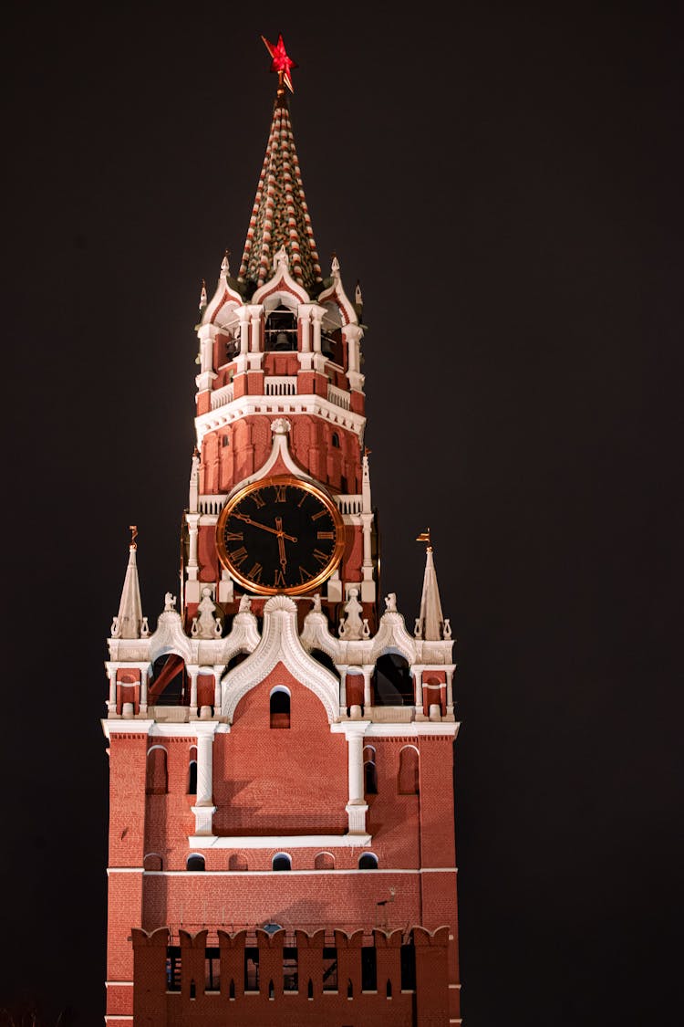 A Clock Tower At Night