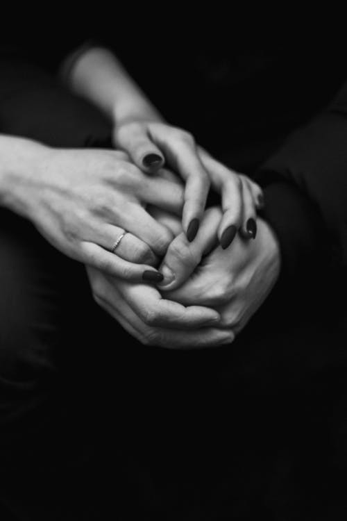 Free Grayscale Photograph of Two People Holding Hands Stock Photo