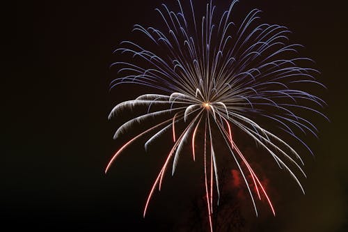 White and Red Fireworks in the Sky