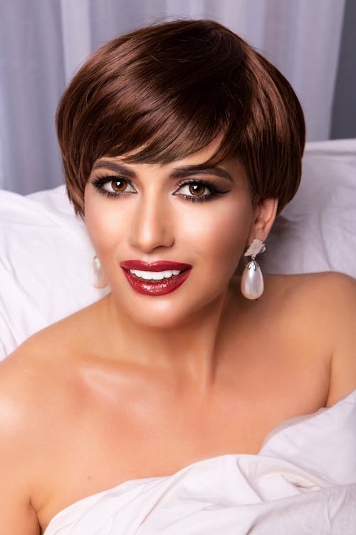 Woman with Short Hair in Glamour Makeup 