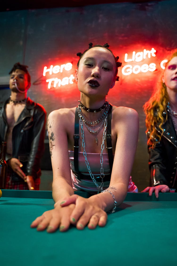 Woman Wearing Chain Necklaces And A Choker