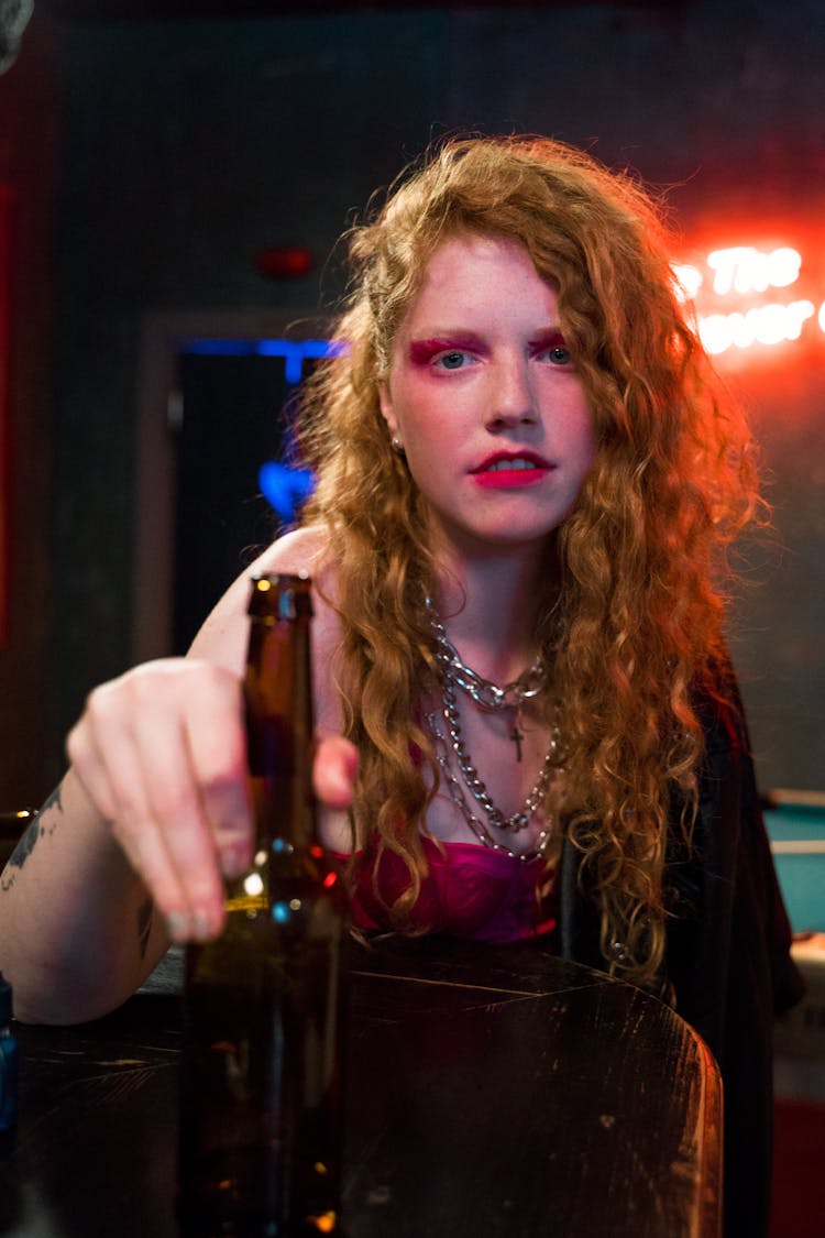 Close-Up Shot Of A Woman At The Bar