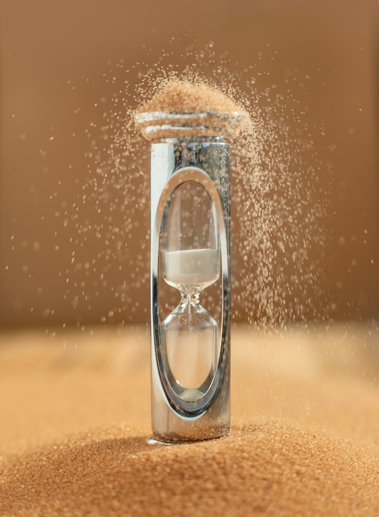 Sand Falling Of From Hourglass