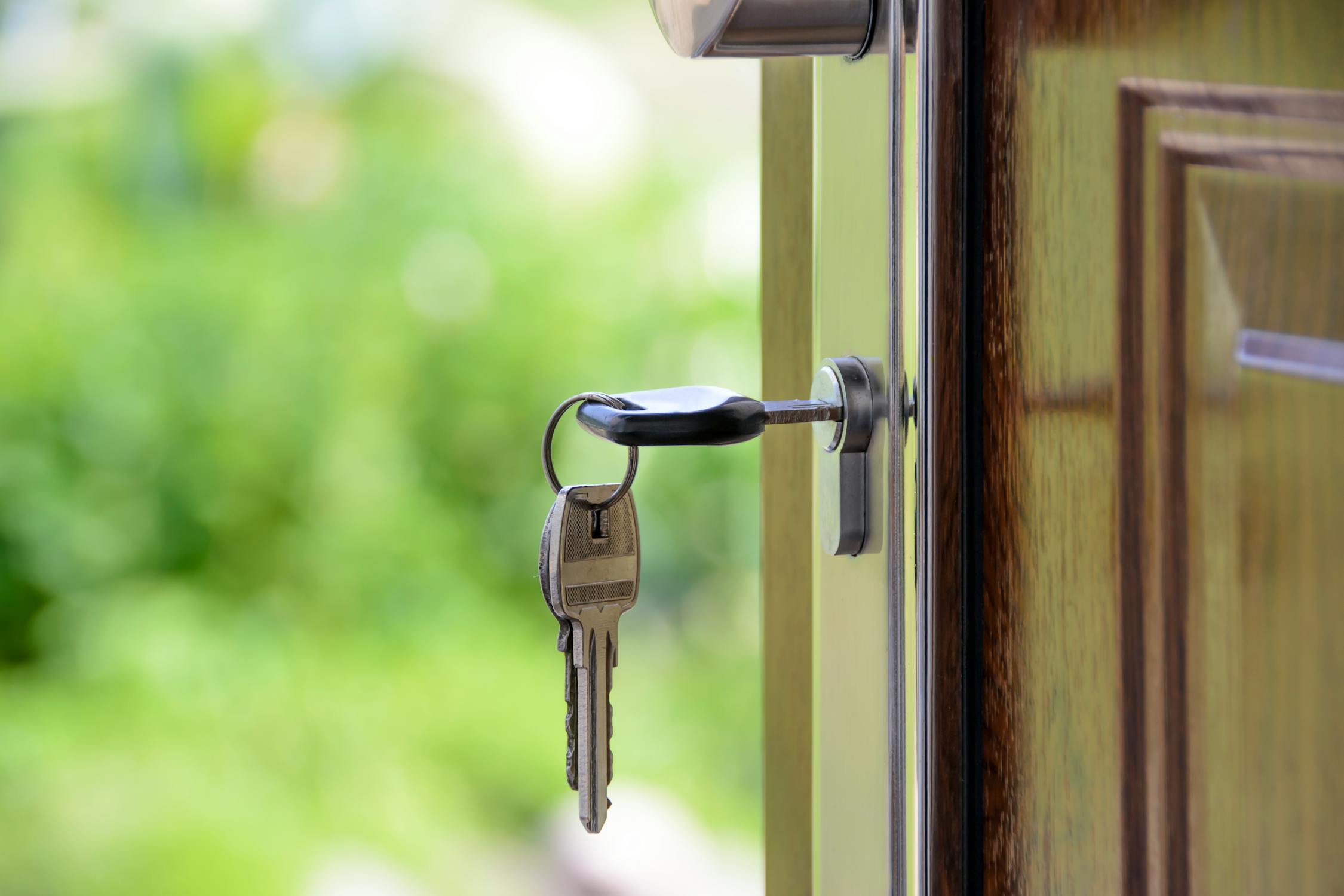 A key in the door - after buying your first home in Miami.