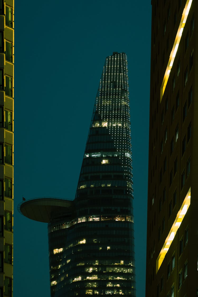 Night Photo Of Skyscraper With Heliport On Top 