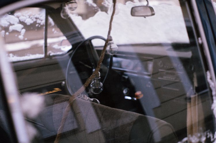 A Rope With Lightbulbs In A Vintage Car