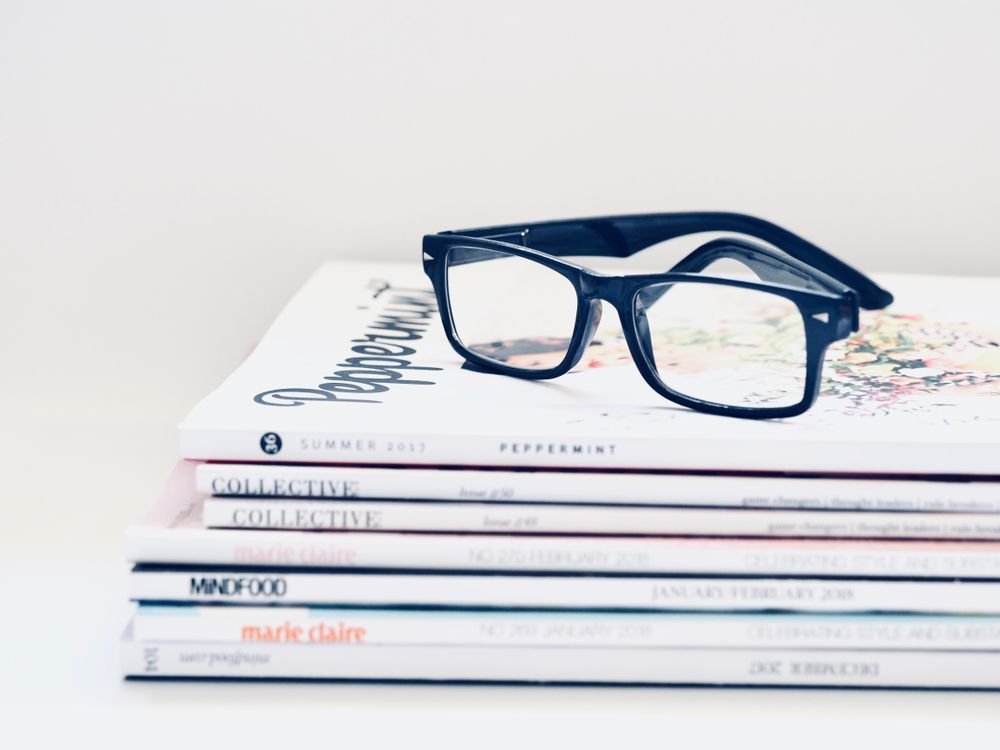 eyeglasses on books