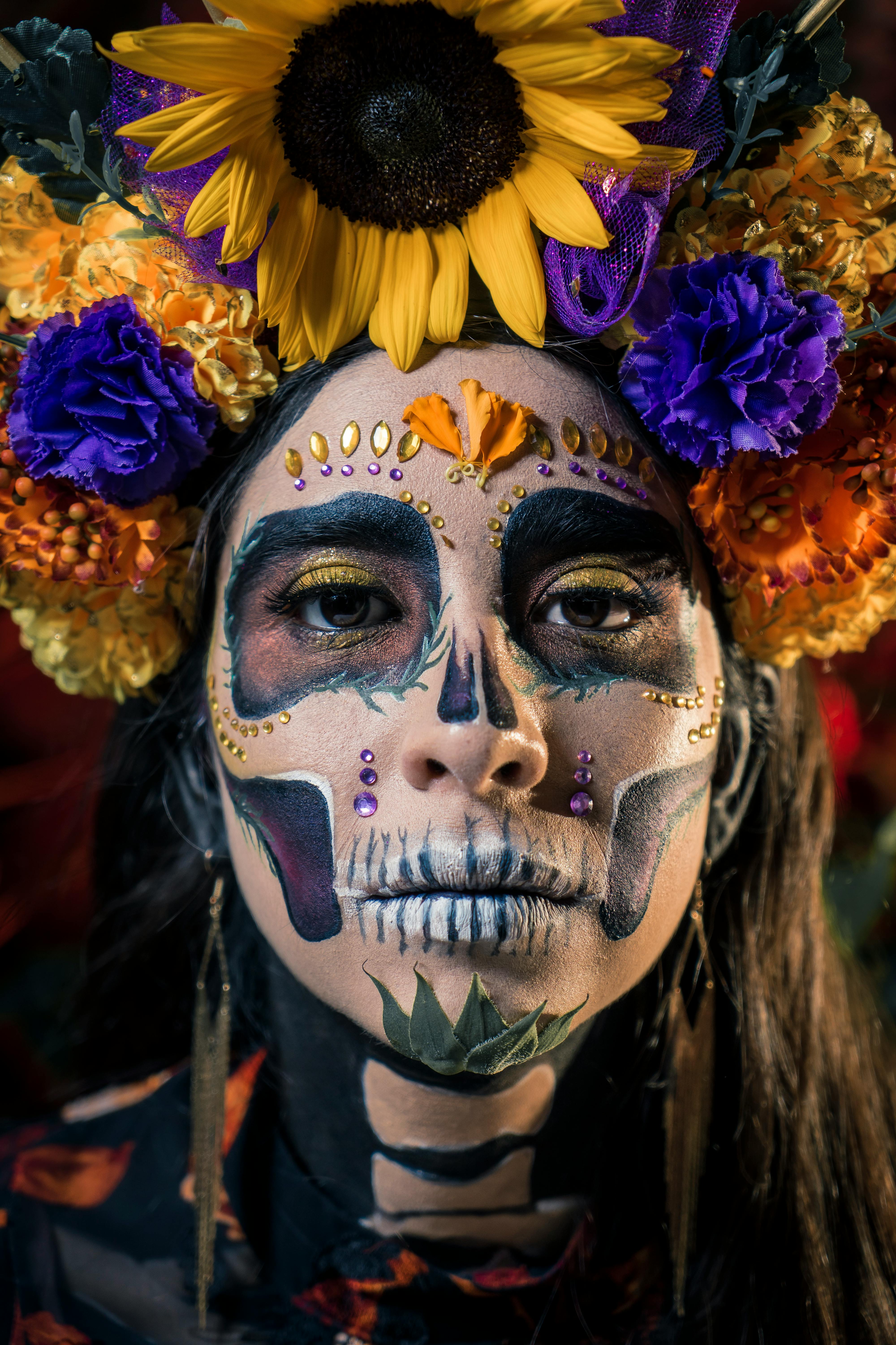 woman in traditional dia de los muertos makeup