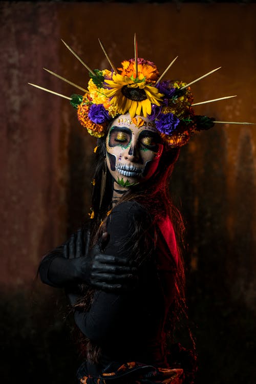 Woman in Halloween Costume with White Floral Headdress · Free Stock Photo