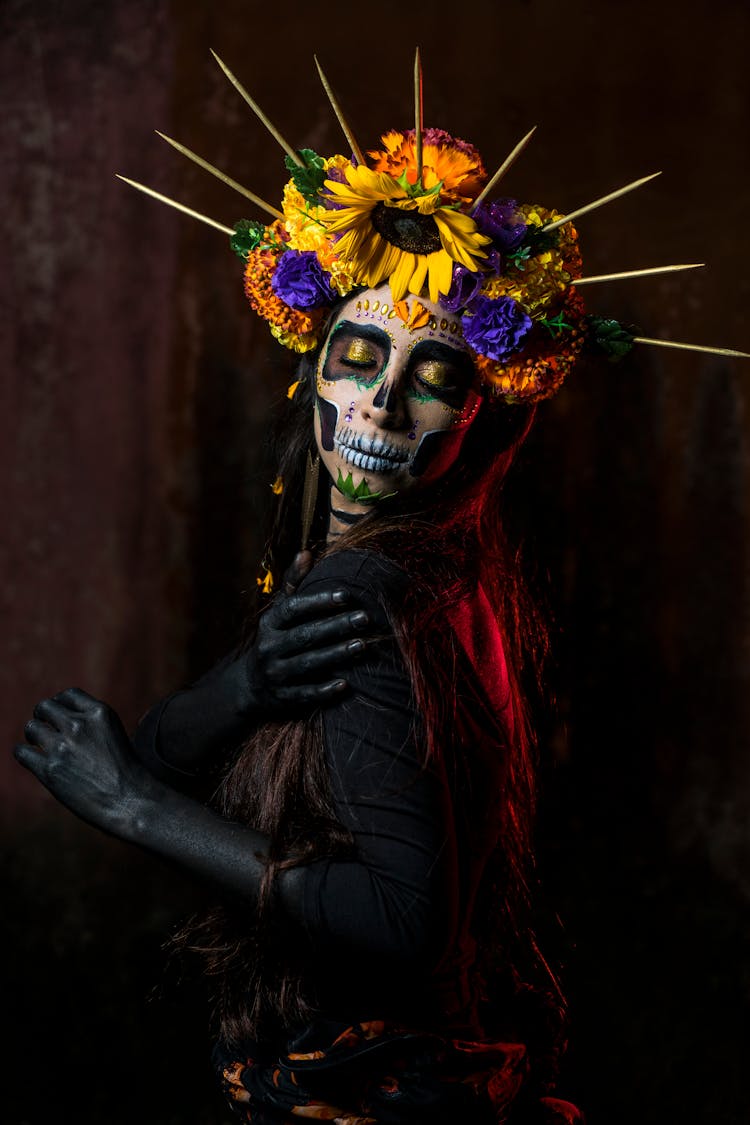 Woman With Face Paint For Day Of Dead In Mexico