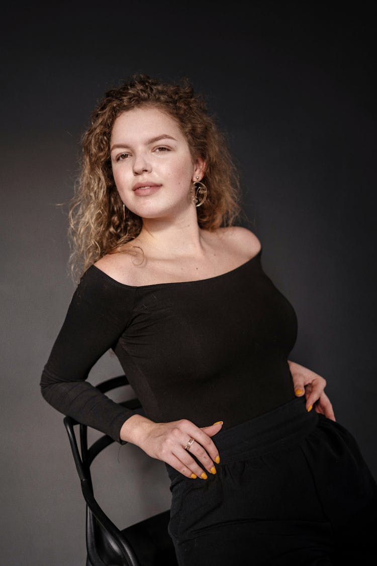 Woman Posing On Chair