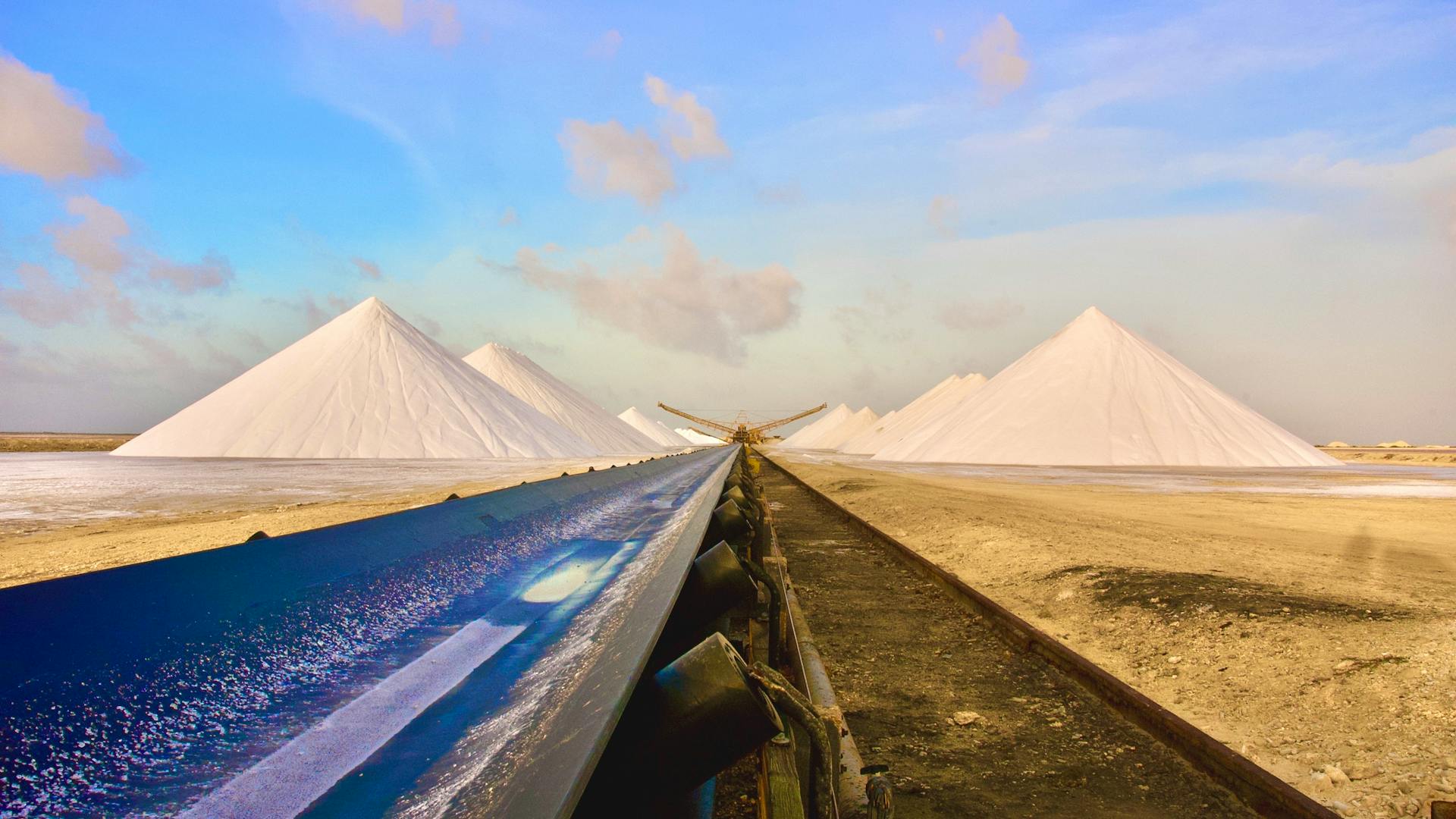 A stunning view of salt heaps and conveyor belt in Kralendijk, Bonaire.
