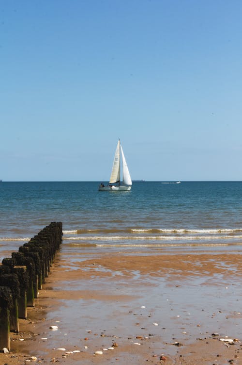 Gratis stockfoto met strand zee boot zomer
