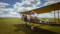 An Old Airplane in a Field